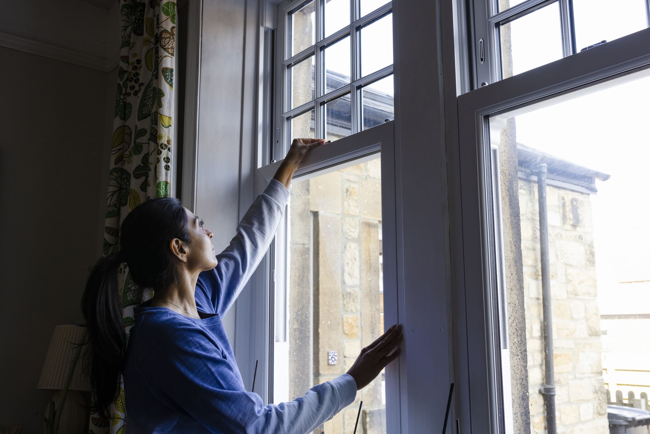 The woman closed her double glazed windows at her home in the North East of England in order to conserve energy when heating her home.